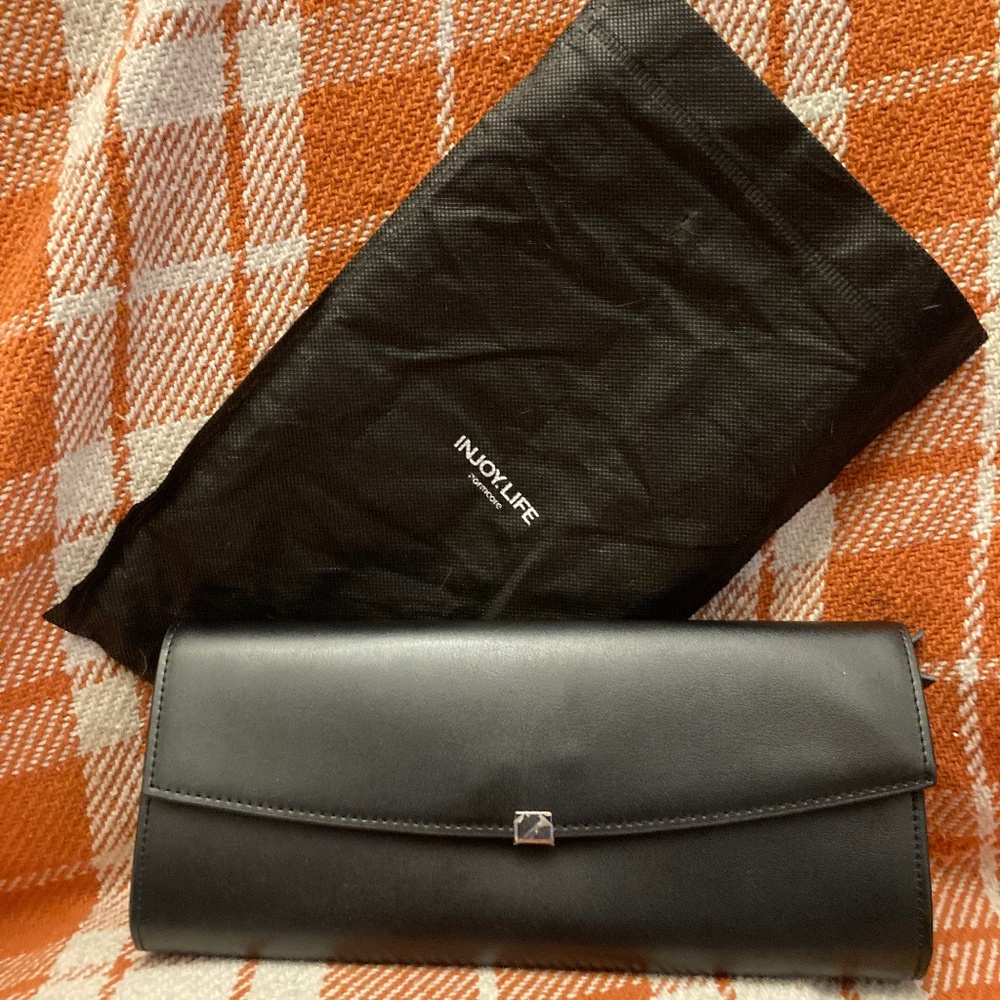 Black injoy.life wallet NWOT  comes with the brand bag